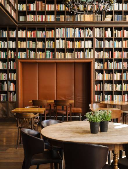 Wall of books in the Library of the B2 Hotel