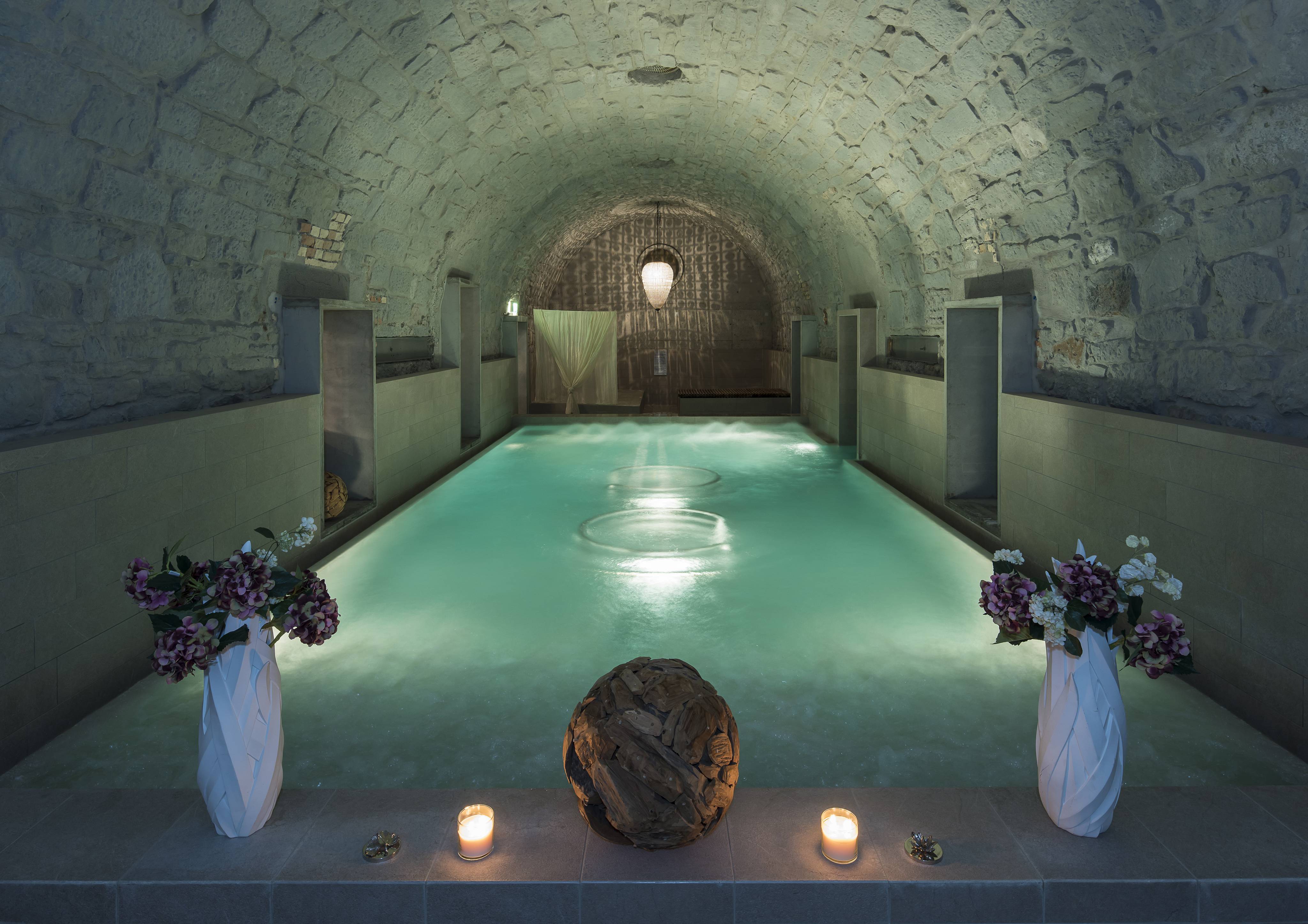 Vaulted cellar with pool at the Huerlimann Bath & Spa Zurich