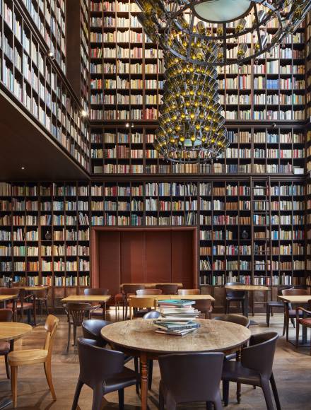 Wall of books in the library at the B2 hotel Zurich