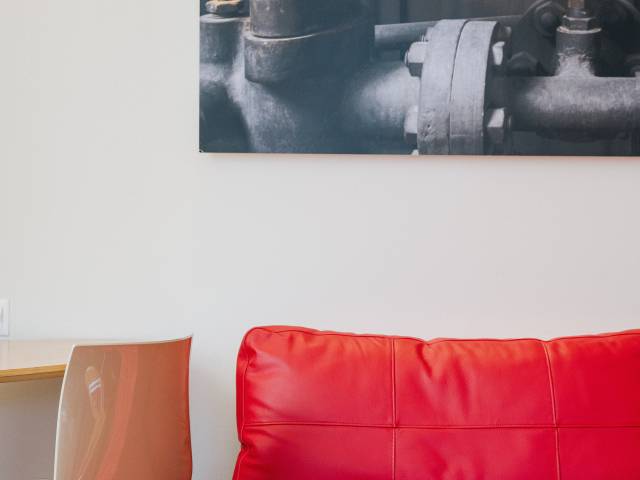 Red couch at the B2 Hotel Zurich